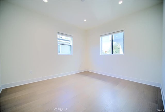 4455 S Slauson Ave, Culver City, CA 90230 - empty room featuring baseboards, a healthy amount of sunlight, and recessed lighting