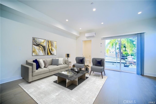 living room with hardwood / wood-style flooring and a wall mounted AC