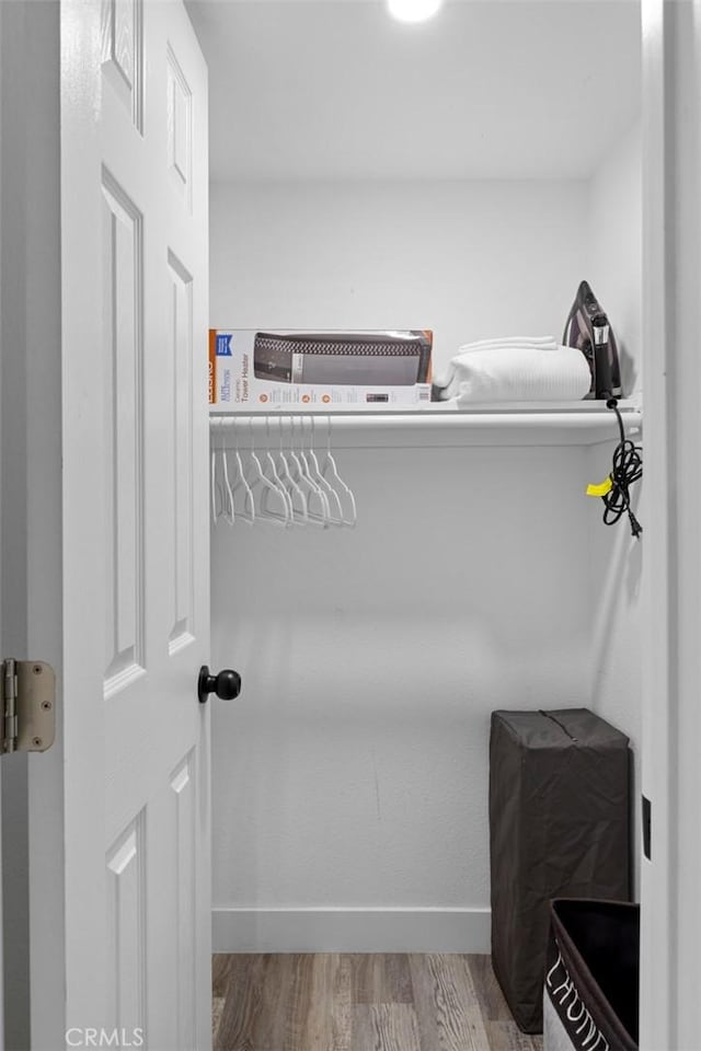 walk in closet featuring light wood-type flooring