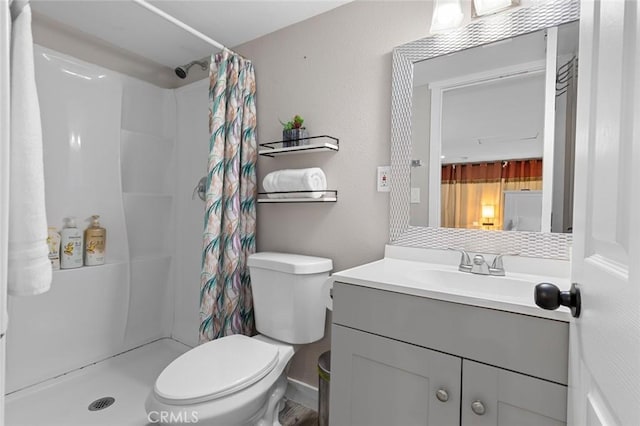 full bath with toilet, a shower stall, and vanity