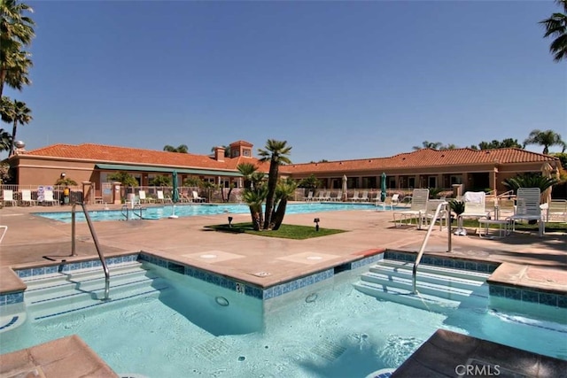 pool with a patio