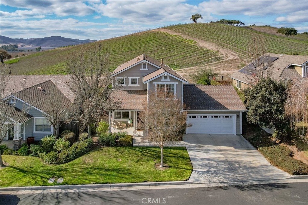 bird's eye view with a mountain view