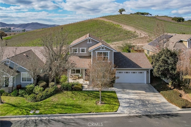 bird's eye view with a mountain view