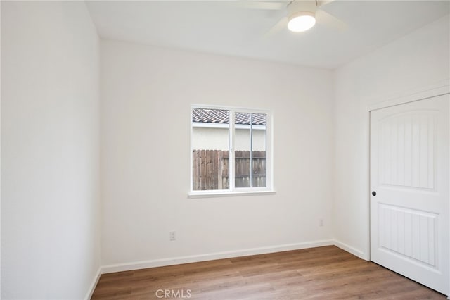 unfurnished room featuring wood-type flooring and ceiling fan