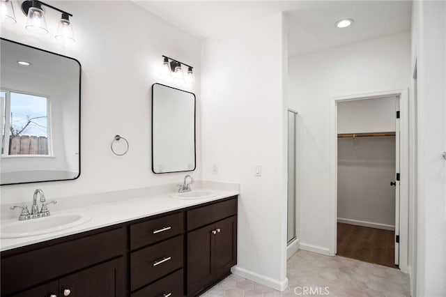 bathroom featuring vanity and walk in shower