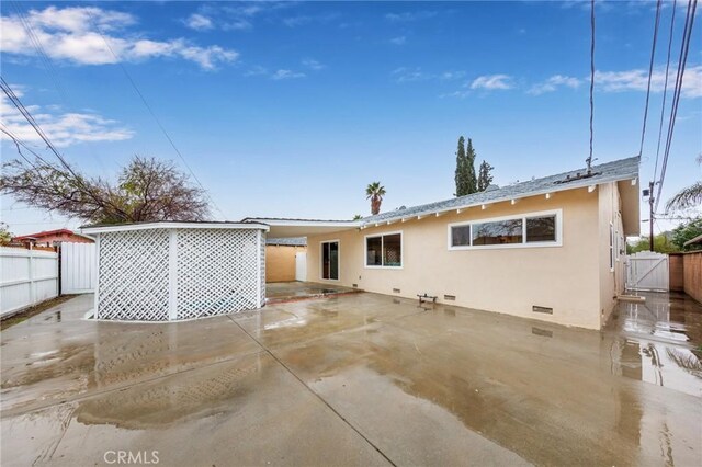 rear view of property with a patio area