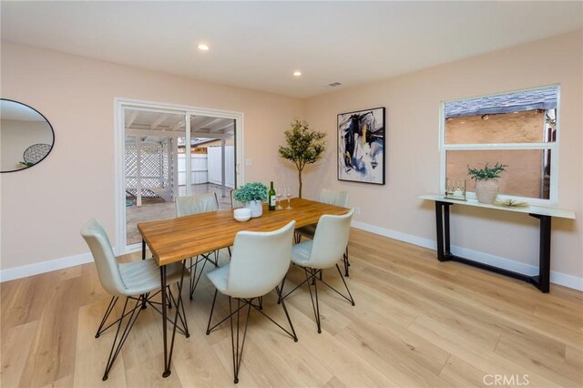 dining room with light hardwood / wood-style floors