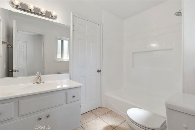 full bathroom featuring bathtub / shower combination, vanity, toilet, and tile patterned flooring