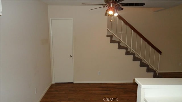 stairs with ceiling fan and wood-type flooring