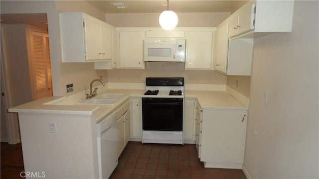 kitchen featuring white cabinetry, white appliances, decorative light fixtures, and sink