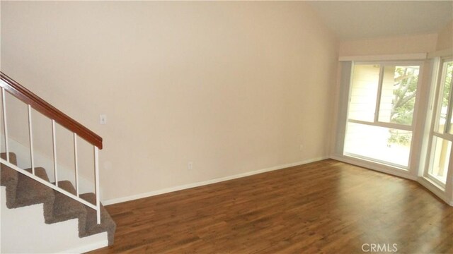 interior space with dark hardwood / wood-style floors