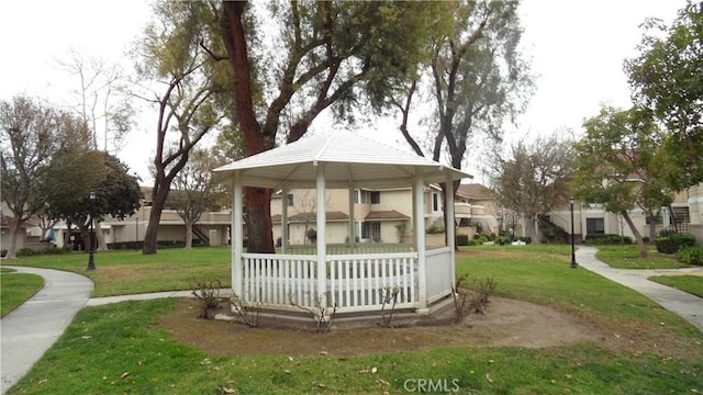 view of community with a gazebo and a lawn