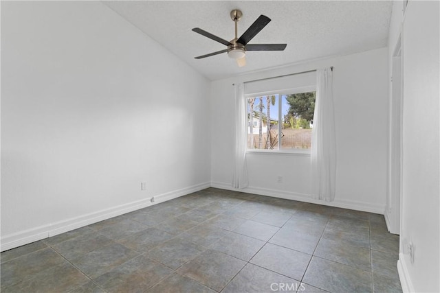 unfurnished room with lofted ceiling, a textured ceiling, and ceiling fan