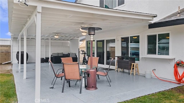 view of patio / terrace featuring ceiling fan