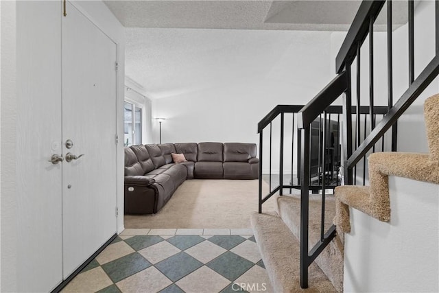 living room featuring a textured ceiling