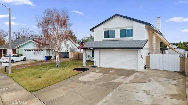 front facade with a garage and a front yard