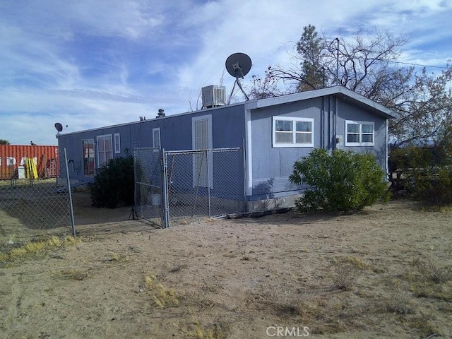 view of home's exterior featuring central AC