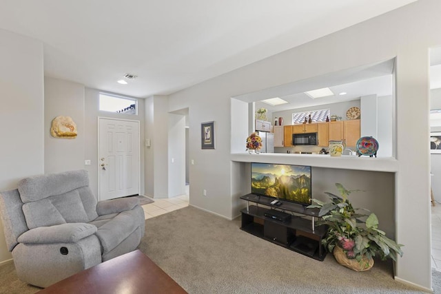 living room featuring light colored carpet