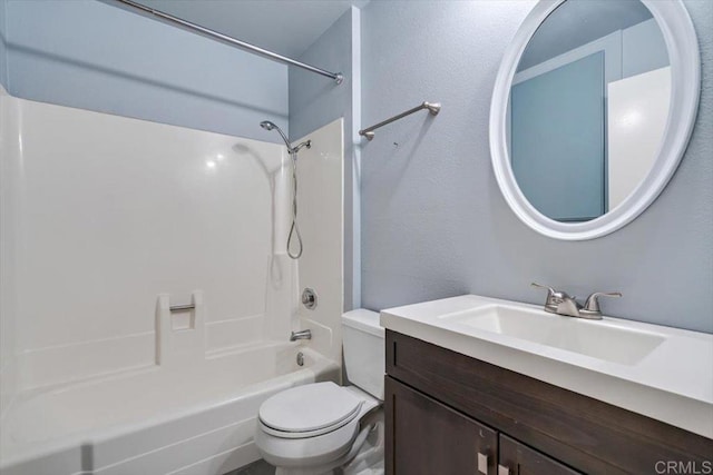 full bathroom featuring shower / tub combination, vanity, and toilet