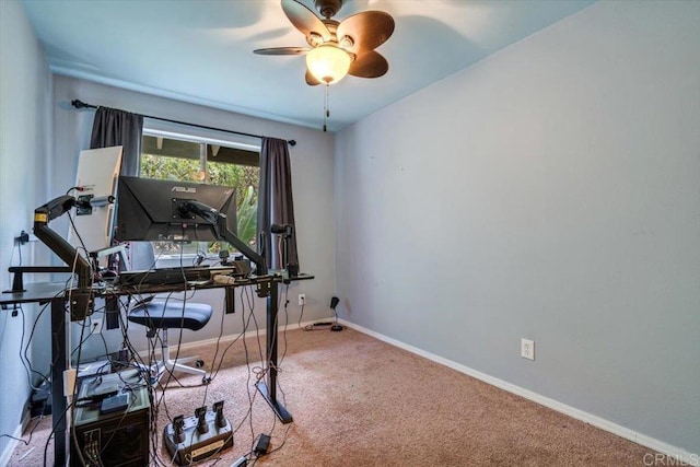 workout area featuring carpet floors and ceiling fan