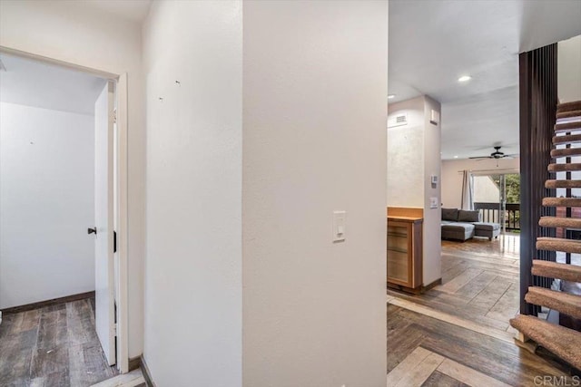 hallway featuring dark parquet floors