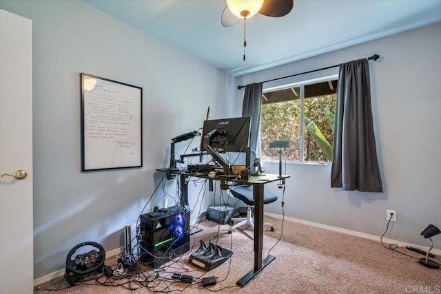 office space featuring ceiling fan and carpet flooring