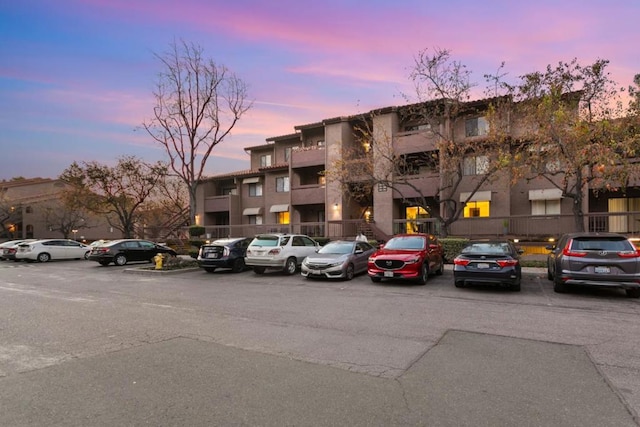 view of outdoor building at dusk