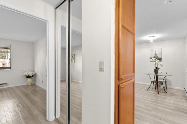 hall featuring light hardwood / wood-style floors