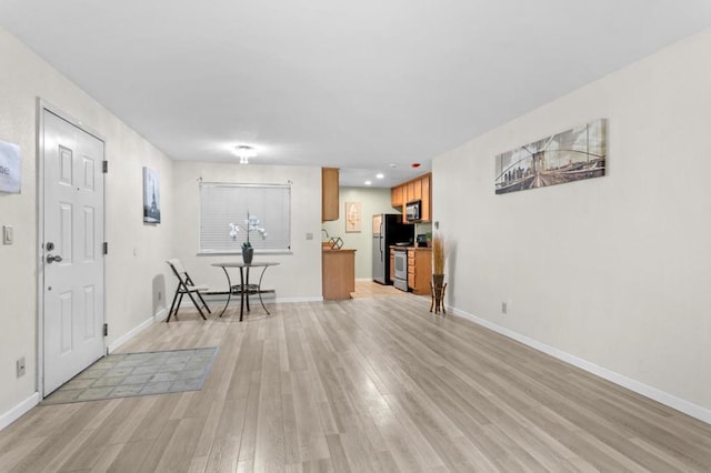 entrance foyer featuring light hardwood / wood-style flooring