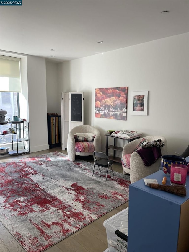 living room with wood-type flooring