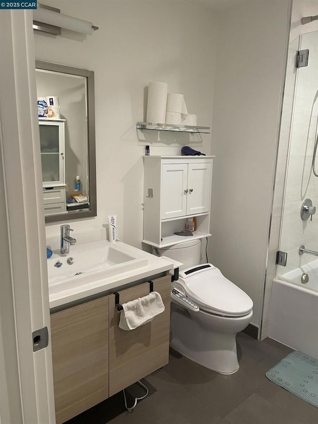 full bathroom featuring toilet, vanity, and shower / washtub combination