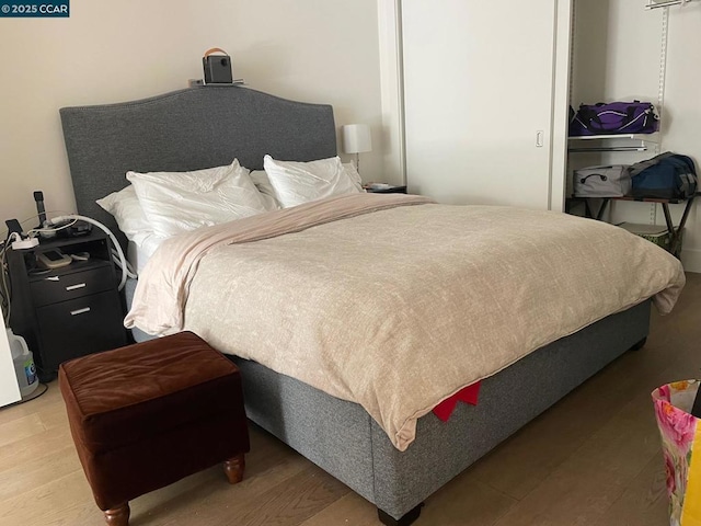 bedroom featuring hardwood / wood-style flooring