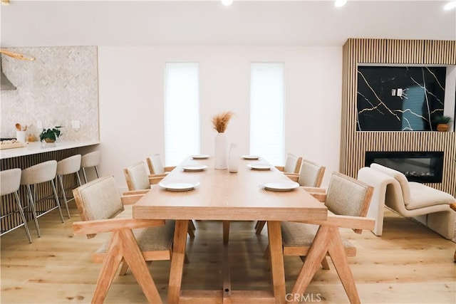 dining room with hardwood / wood-style flooring