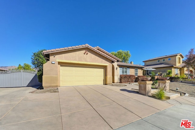 view of front of home with a garage