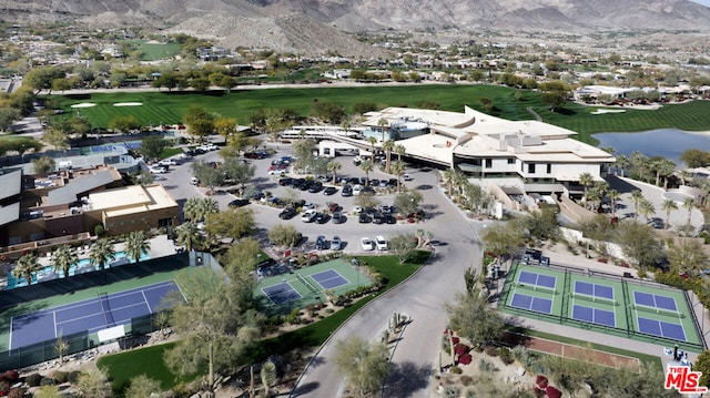 aerial view featuring a water and mountain view