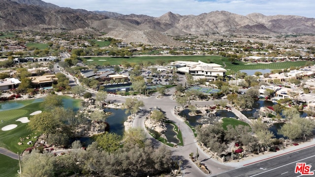 bird's eye view with a water and mountain view