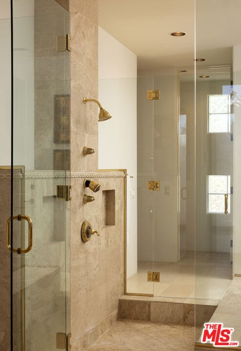 bathroom featuring tile patterned floors and walk in shower