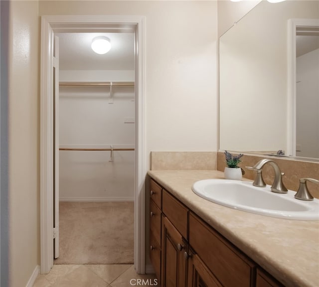 bathroom with vanity and tile patterned floors