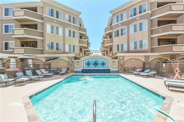 view of swimming pool featuring a patio