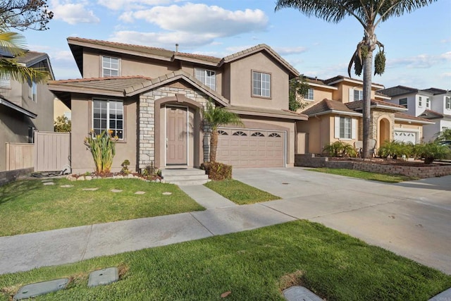 view of front of house featuring a garage and a front lawn