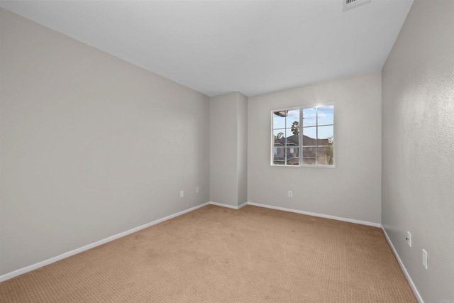 view of carpeted spare room