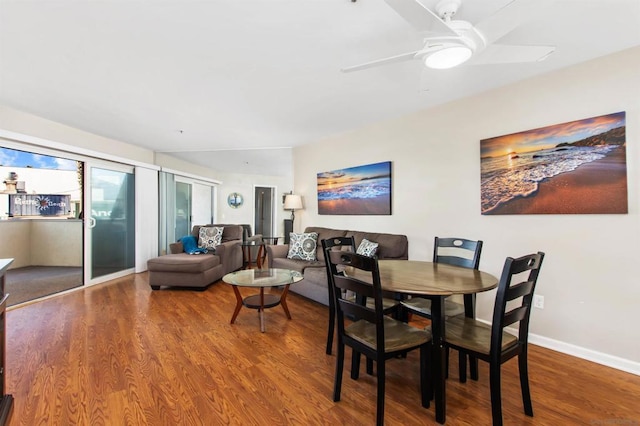 dining room with hardwood / wood-style floors and ceiling fan