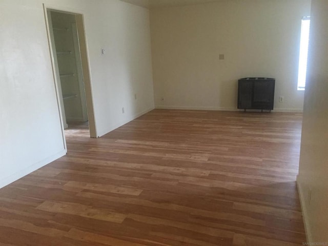 empty room featuring dark hardwood / wood-style floors