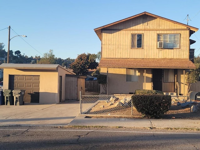 front of property with a garage