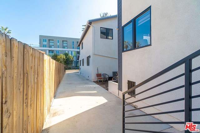 view of property exterior featuring a patio