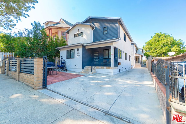 view of front of home featuring a patio