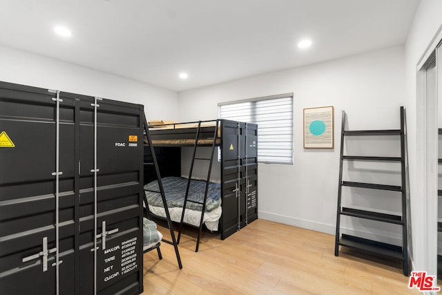 bedroom featuring light wood-type flooring