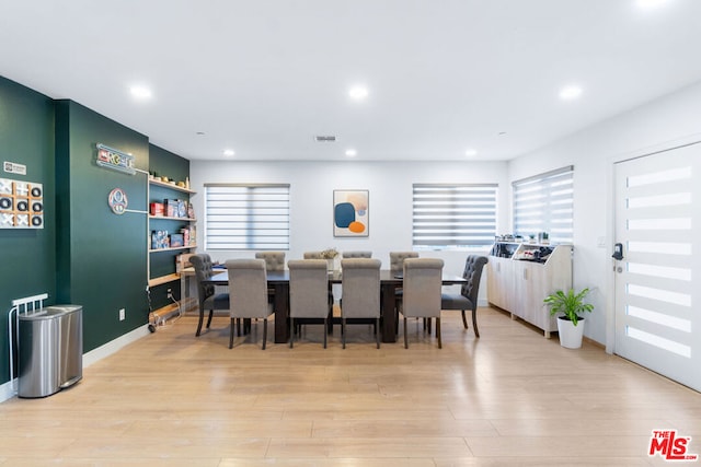 dining room featuring light hardwood / wood-style flooring