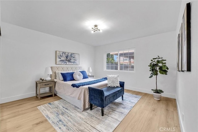 bedroom featuring wood-type flooring