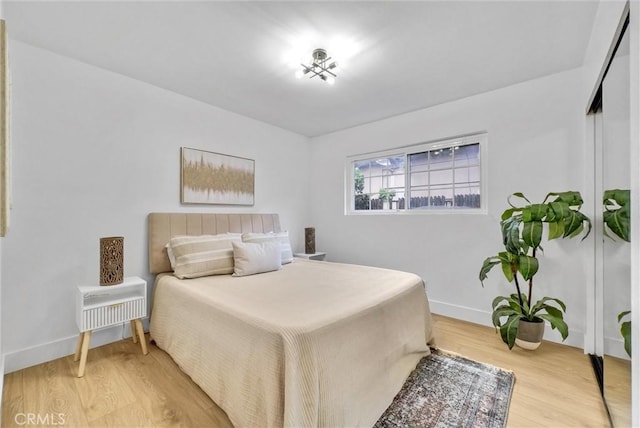 bedroom featuring hardwood / wood-style flooring